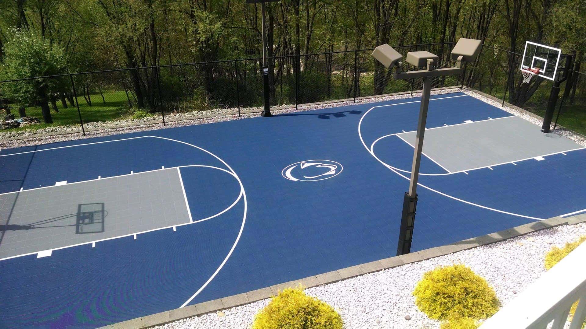 Blue Basketball Court with logo in middle