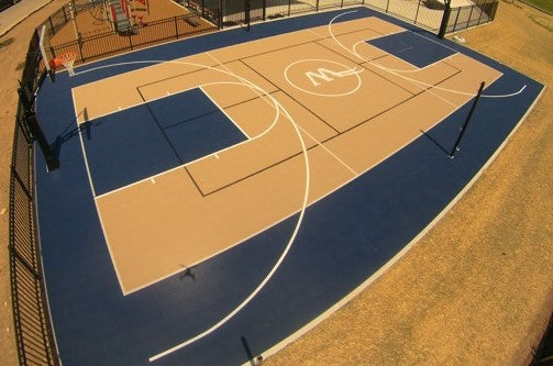custom multi game sport court in tan and blue